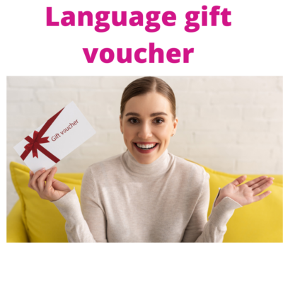 smiling girl on a sofa holding up a gift voucher